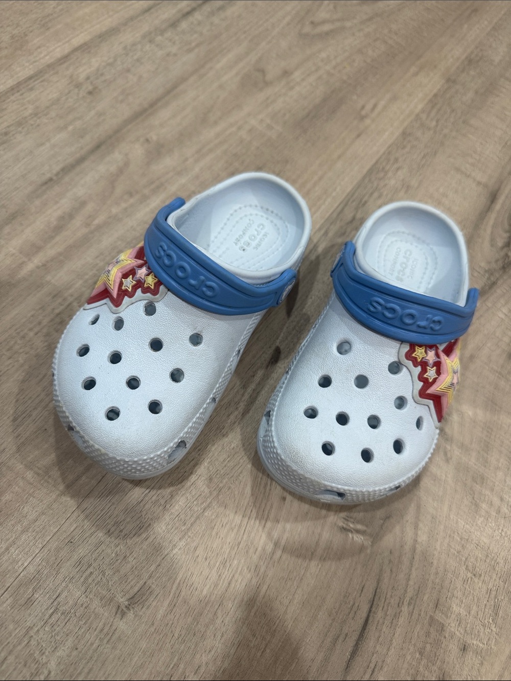 CROCS Kids White Clogs with Blue Strap and Red Star Charms